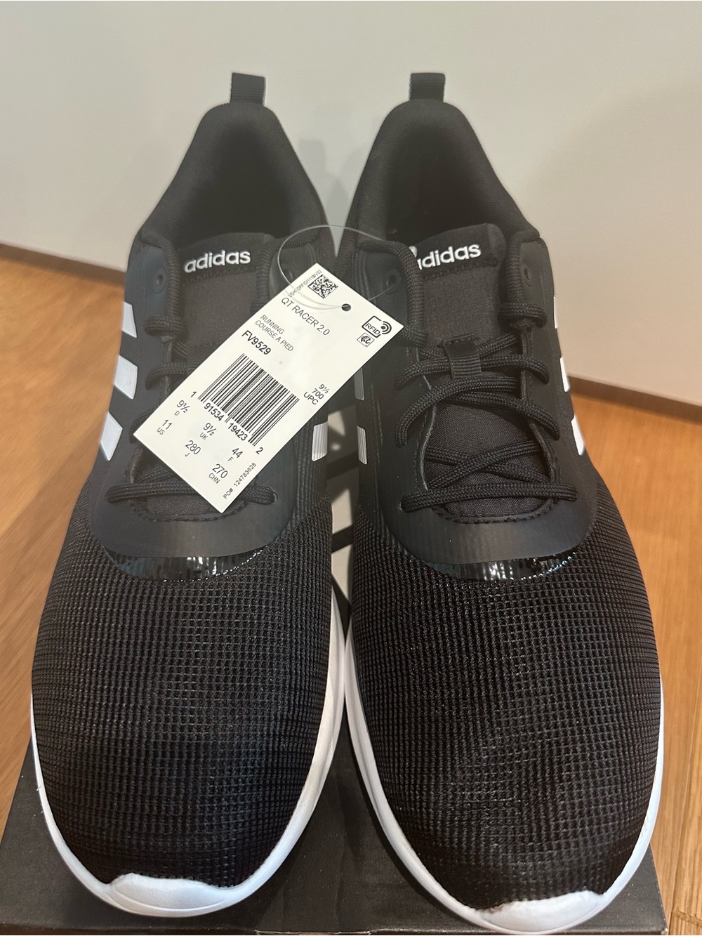 adidas Women's Black Athletic Sneakers with White Stripes